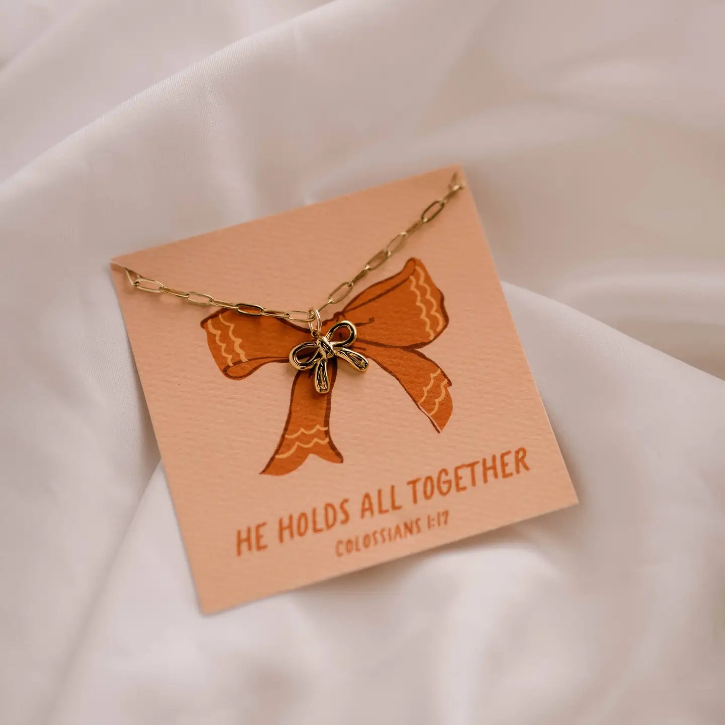 'HE HOLDS ALL TOGETHER' NECKLACE